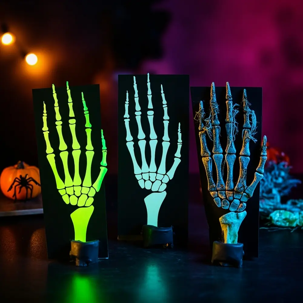 How to Craft a Moving Skeleton Hand from Paper and Straws 10 Image-10: A vibrant photo collage showing three different customized hands: one glowing in the dark, one made from black paper, and a green “zombie” hand.