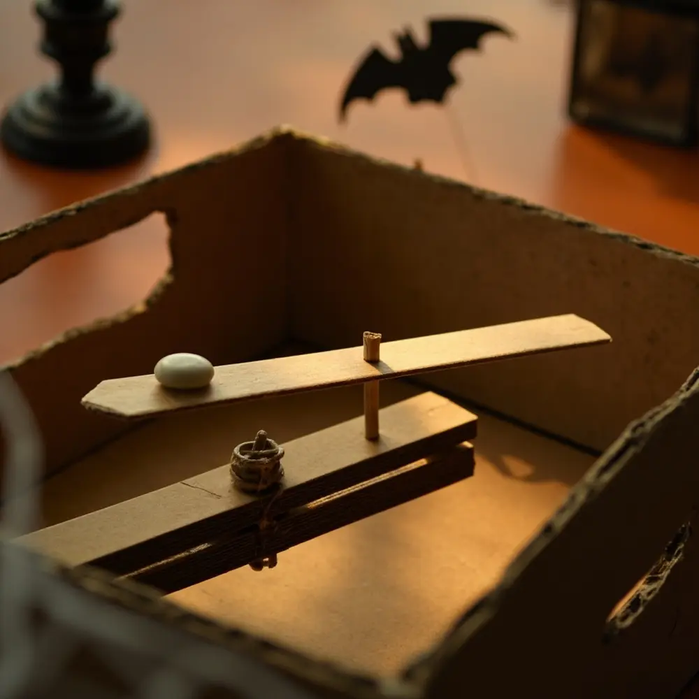 How to Engineer a Frankenstein-Themed Candy Dispenser 3 Platform small view the fulcrum showing mechanism lever s installed pivot point end on and an h3 to attached is of cardboard image internal strong box 3 focus inside 8217 being