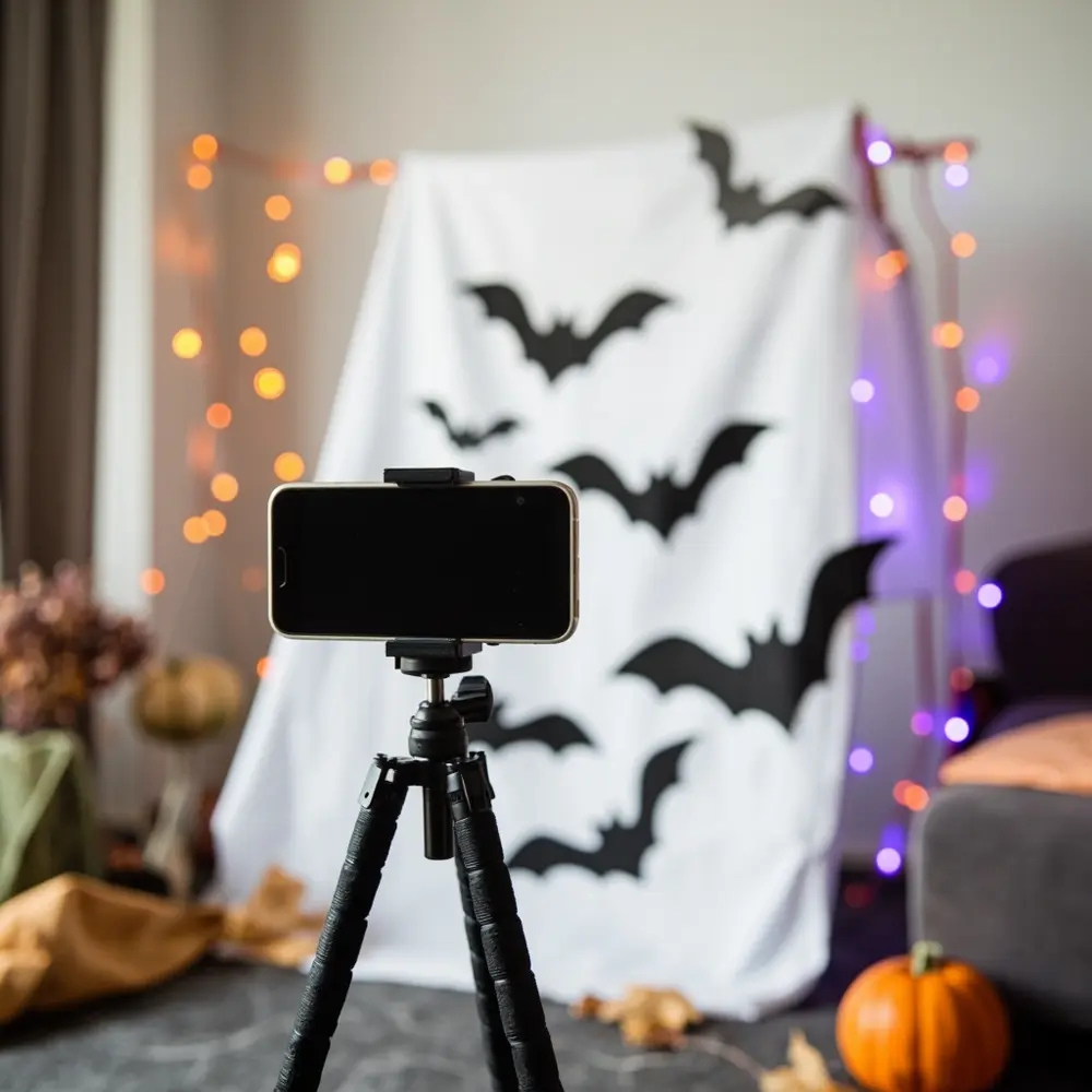 A Step-by-Step Guide to Setting Up a DIY Family Photo Booth 6 Bat diy small positioned the backdrop take themed completed a tripod on h3 to pictures of in ready smartphone image front 5 secured