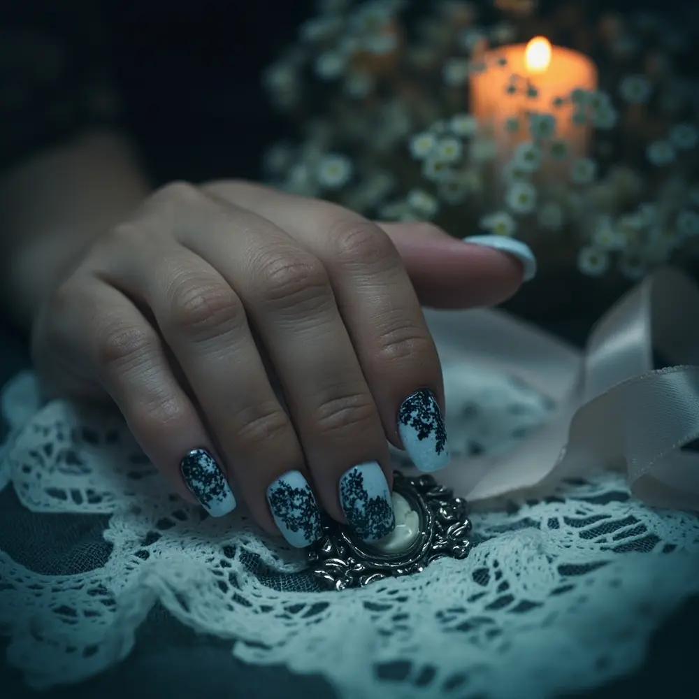 18 Genuinely Spooky & Scary Halloween Nail Ideas for 2025 15 White patterns instruction black base distressed decay delicate with perhaps 15 overlaid a grey of p or subtle slightly lace pale image hint placement blue ghostly nails