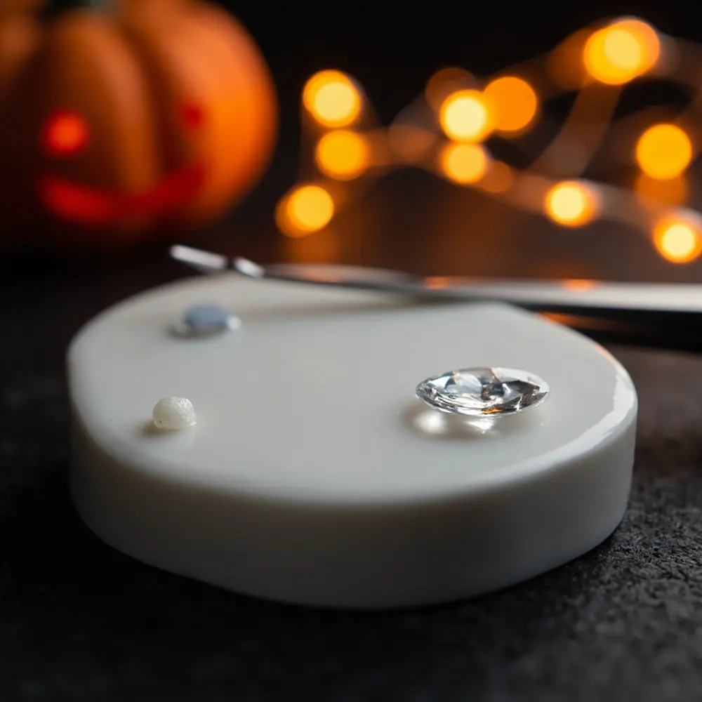 Sparkle All Night: How to Apply Face Gems That Actually Stay On (No Falling Off!) 2 Gem tweezers with on a face up of p small dot or the nearby shot em back close skin glue image eyelash 2