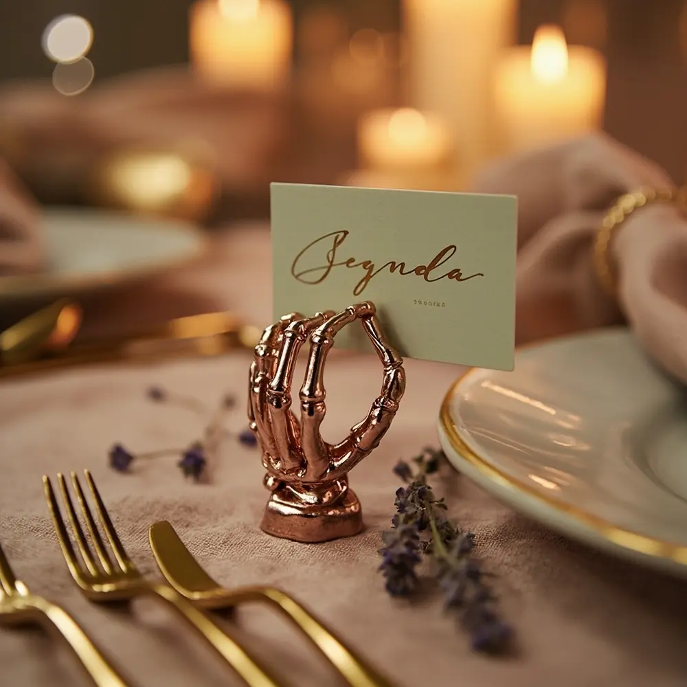 21 Cute Spooky Wedding Ideas That Are More Sweet Than Scary 9 Metallic hand finish skeleton h2 place card holders 9