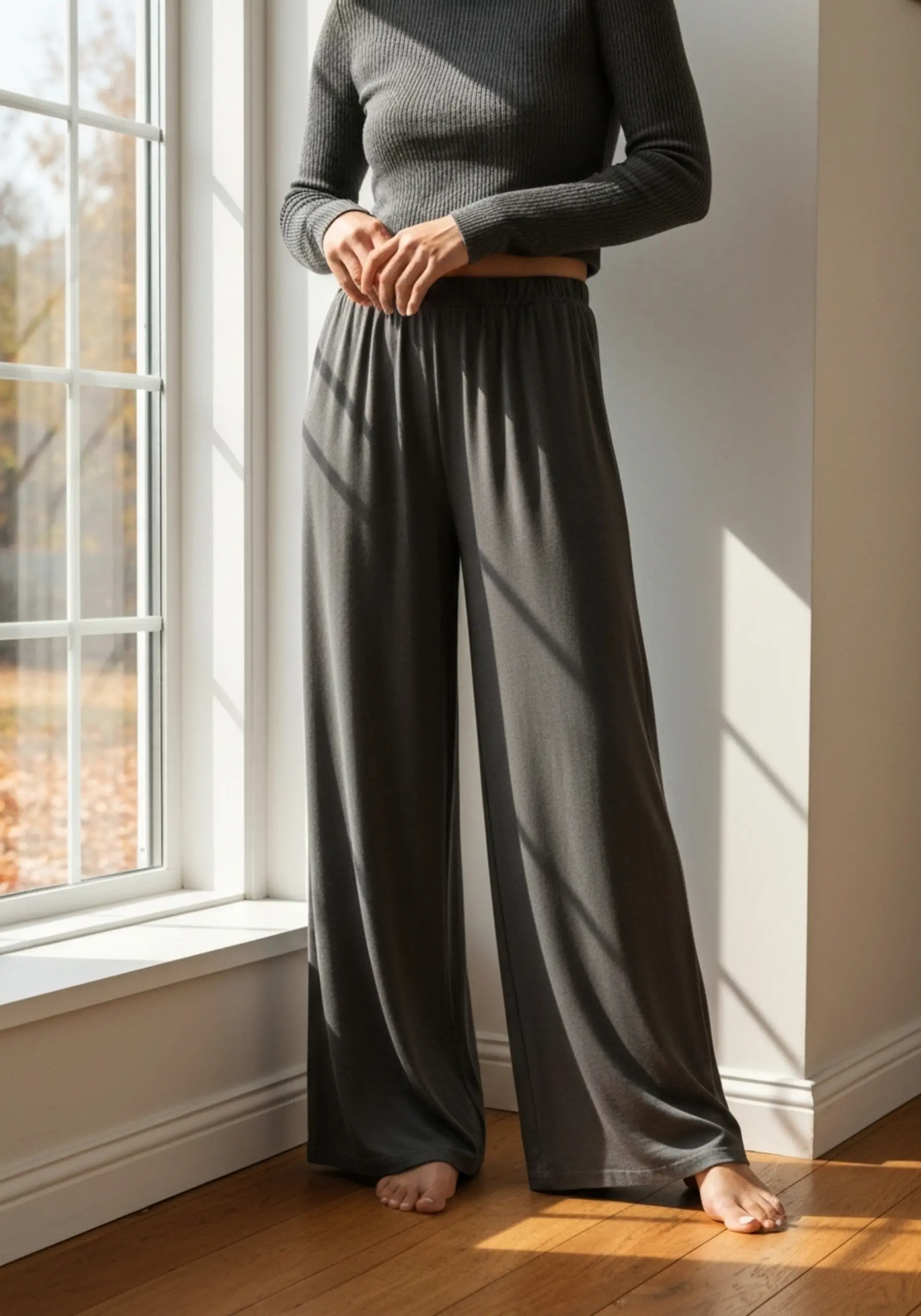 Leg woman flowy drape lounge wide a grey of near p wearing the pant show set image pants window standing 3 charcoal to