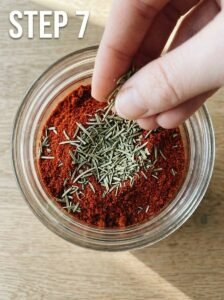 Female_hand_sprinkling_herbs_202605251656_kaveeshmommy_ -