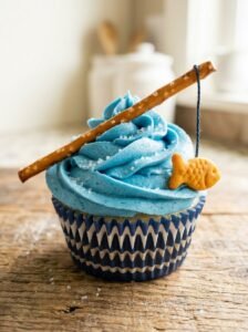 Fishing_cupcake_with_blue_frosting_202605241728_kaveeshmommy_ -
