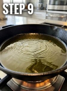 Hot_oil_shimmering_in_skillet_202605251148_kaveeshmommy_ -