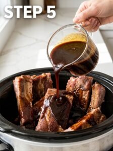 Person_drizzling_sauce_on_ribs_202605252121_kaveeshmommy_ -