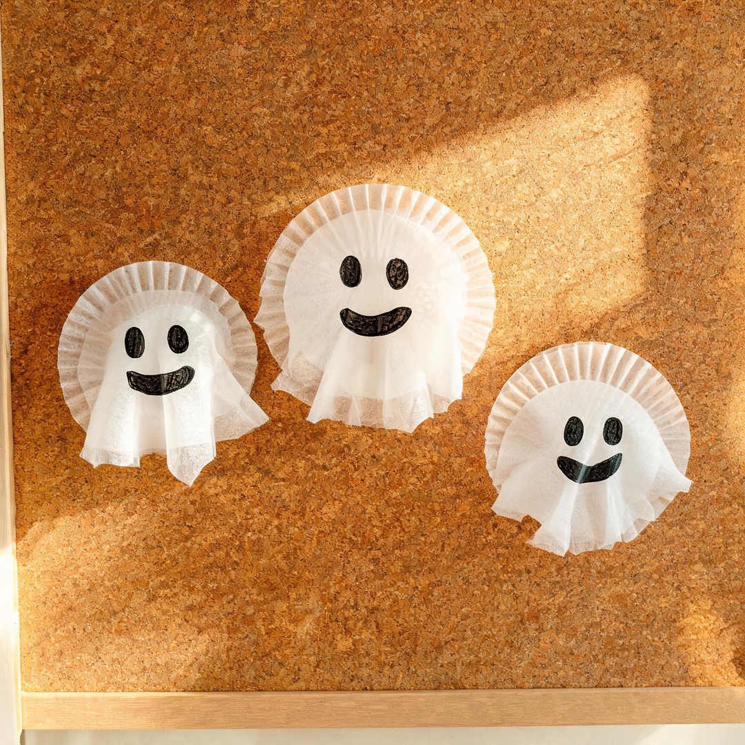 10 Easy Halloween Crafts for School (Grades 1-5) 4 Coffee Filter Fluffy Ghost - Fluted round coffee filter ghost craft for classroom bulletin boards